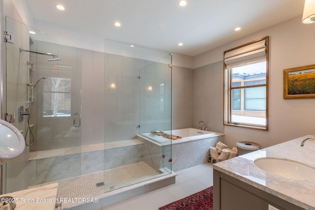 full bathroom with vanity, recessed lighting, a stall shower, tile patterned flooring, and a garden tub