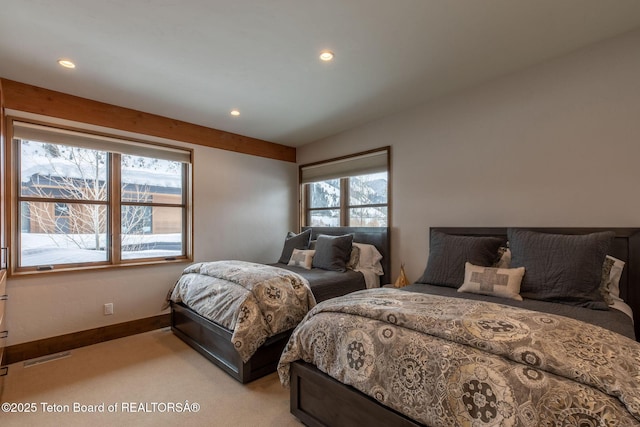 bedroom featuring light carpet, baseboards, and recessed lighting