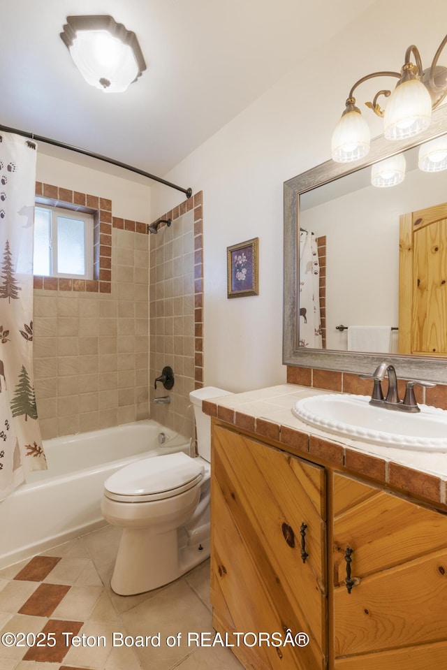 full bathroom featuring shower / bath combo with shower curtain, toilet, tile patterned flooring, and vanity