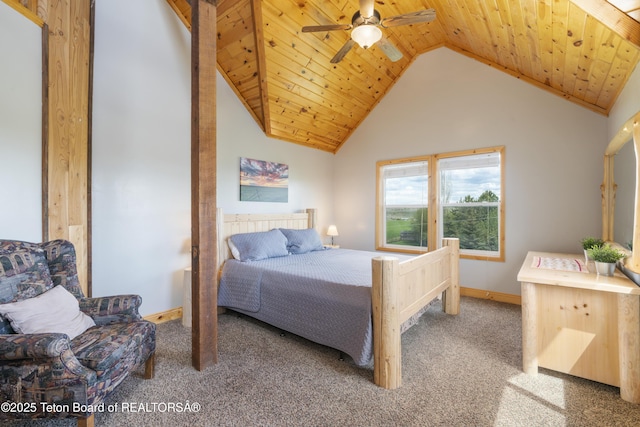 carpeted bedroom with wooden ceiling, vaulted ceiling, baseboards, and a ceiling fan