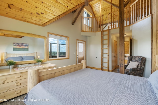 bedroom with high vaulted ceiling and wooden ceiling
