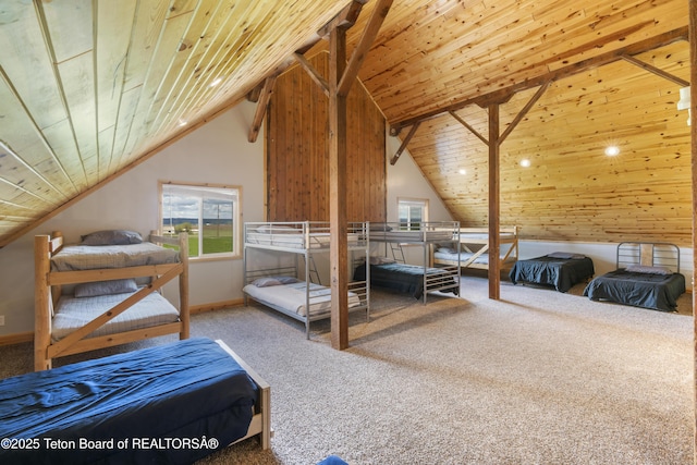 bedroom with vaulted ceiling, wood ceiling, carpet floors, and multiple windows