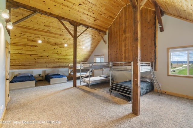 carpeted bedroom featuring baseboards, wooden ceiling, and vaulted ceiling
