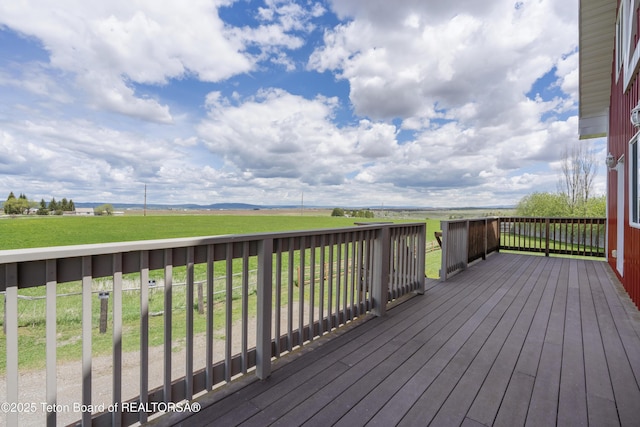 wooden terrace with a rural view