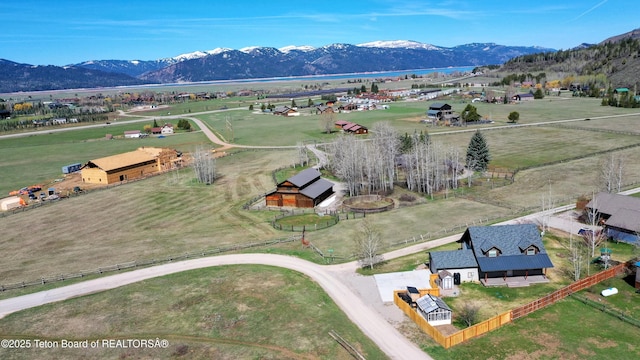 birds eye view of property featuring a rural view and a mountain view