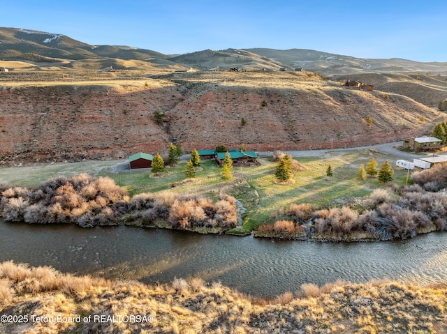 9 Warm Springs Rd, Dubois, WY 82513 - view of mountain feature with a water view