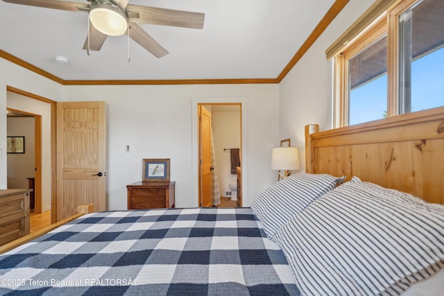 9 Warm Springs Rd, Dubois, WY 82513 - bedroom featuring a ceiling fan, connected bathroom, and crown molding