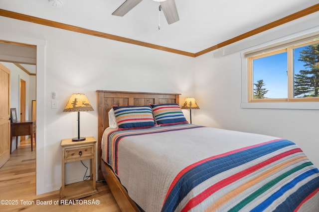 9 Warm Springs Rd, Dubois, WY 82513 - bedroom with ceiling fan, wood finished floors, baseboards, and ornamental molding