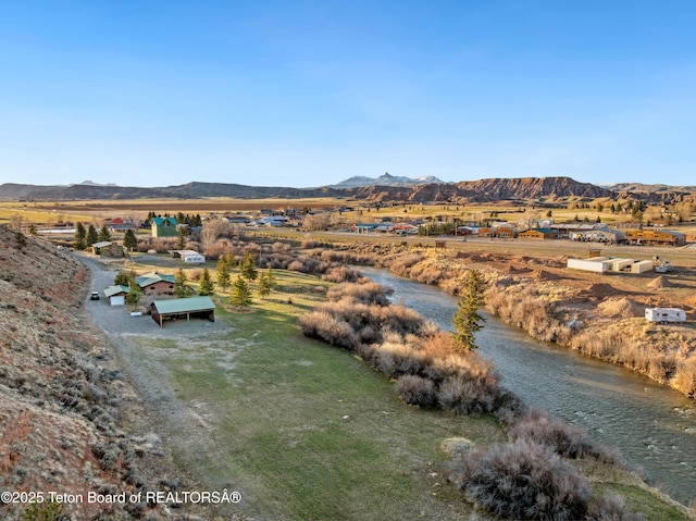 9 Warm Springs Rd, Dubois, WY 82513 - drone / aerial view with a rural view and a mountain view