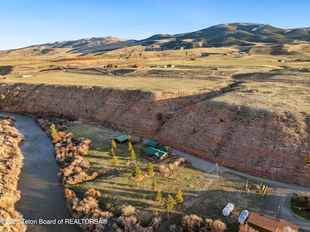 9 Warm Springs Rd, Dubois, WY 82513 - view of mountain feature featuring a rural view