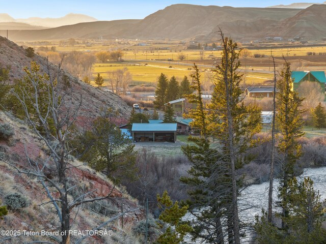 9 Warm Springs Rd, Dubois, WY 82513 - birds eye view of property with a rural view and a mountain view