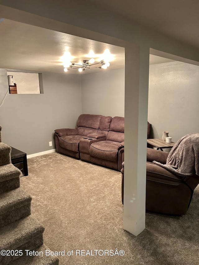 living area with carpet flooring, stairs, and baseboards