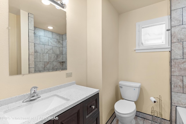 519 Jefferson, Afton, WY 83110 - full bathroom featuring toilet, vanity, and tile patterned floors