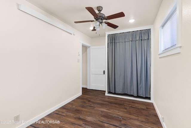 519 Jefferson, Afton, WY 83110 - unfurnished bedroom featuring dark wood-type flooring, baseboards, ceiling fan, and recessed lighting