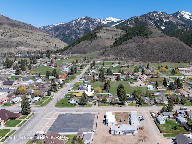 519 Jefferson, Afton, WY 83110 - aerial overview of property's location featuring a mountainous background and nearby suburban area