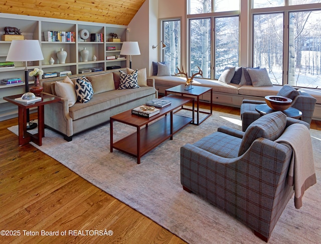 2985 N Alder Wood Ln, Wilson, WY 83014 - living room featuring plenty of natural light, vaulted ceiling, wood finished floors, and wood ceiling