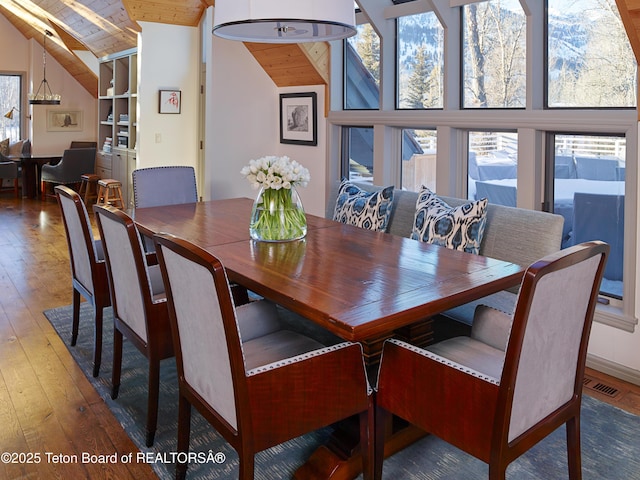 2985 N Alder Wood Ln, Wilson, WY 83014 - dining room featuring hardwood / wood-style flooring, wooden ceiling, and high vaulted ceiling