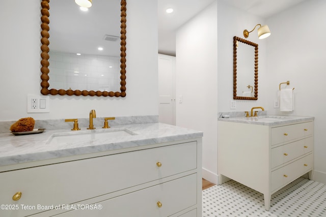 735 Snow King Dr, Jackson, WY 83001 - bathroom featuring two vanities, recessed lighting, tile patterned floors, and baseboards