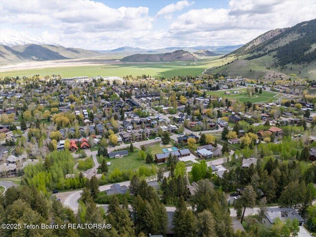 735 Snow King Dr, Jackson, WY 83001 - aerial view of property and surrounding area with a mountainous background and nearby suburban area