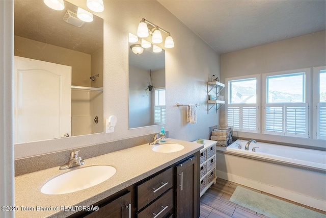 350 Little Greys Loop, Etna, WY 83118 - bathroom with a bath, double vanity, and a shower