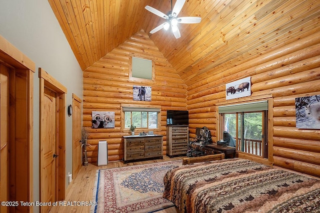 109 Redwood Rd, Star Valley Ranch, WY 83127 - bedroom with high vaulted ceiling, wood ceiling, multiple windows, and light wood-style floors