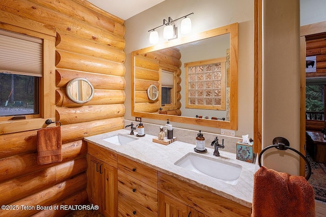 109 Redwood Rd, Star Valley Ranch, WY 83127 - bathroom featuring rustic walls and double vanity