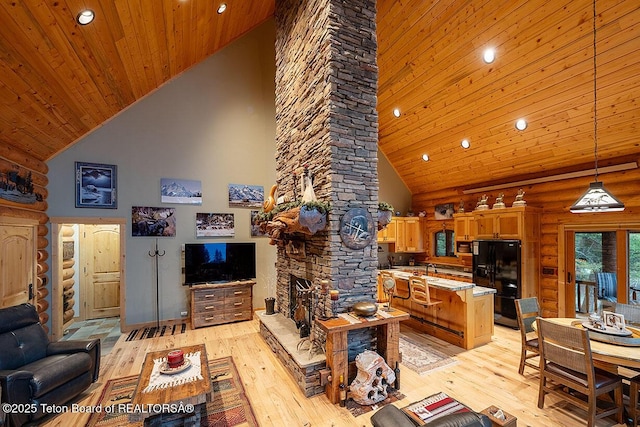 109 Redwood Rd, Star Valley Ranch, WY 83127 - living room featuring high vaulted ceiling, wood ceiling, decorative columns, light wood-style flooring, and recessed lighting