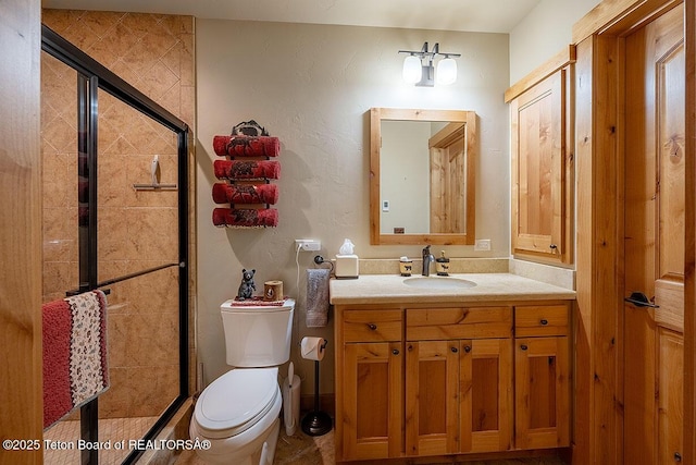 109 Redwood Rd, Star Valley Ranch, WY 83127 - full bathroom with a stall shower, toilet, and vanity