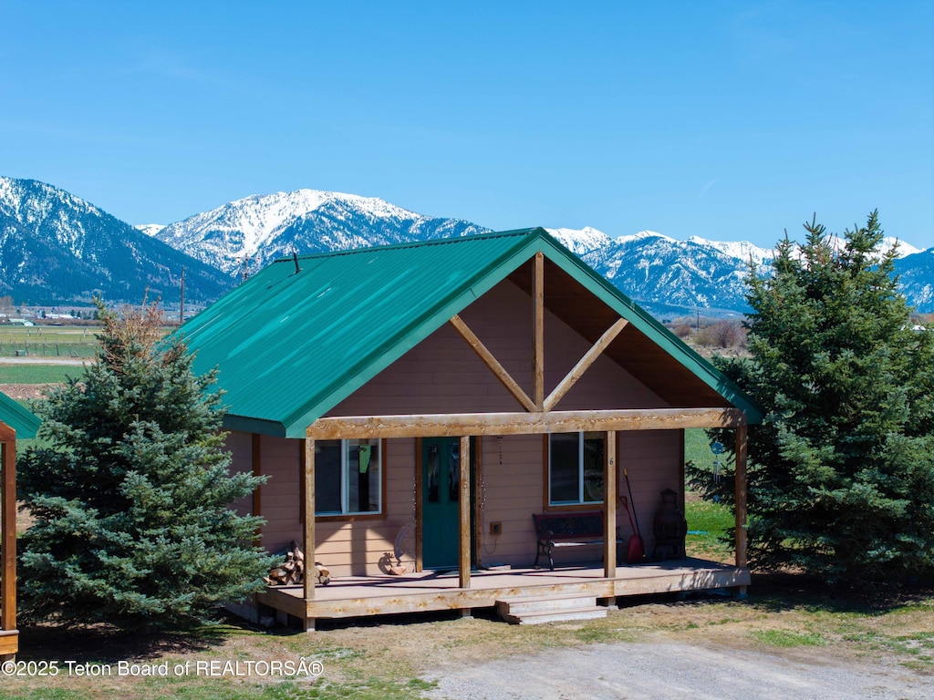 263 Friesian Cir Unit 6, Thayne, WY 83127 - view of front of house with a mountain view