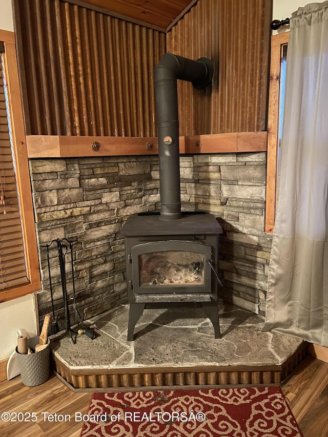 51 Cheyenne Cir, Star Valley Ranch, WY 83127 - detailed view of a wood stove and wood finished floors