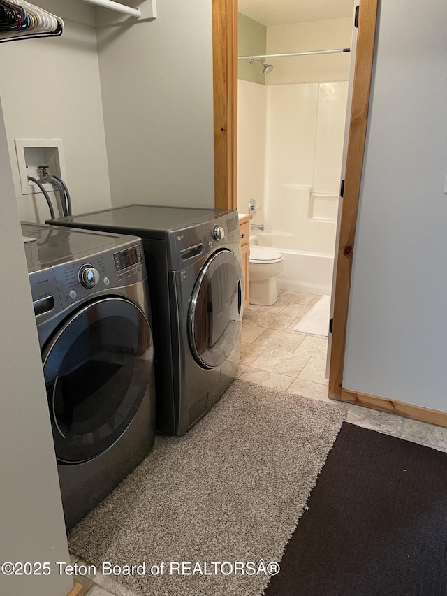 51 Cheyenne Cir, Star Valley Ranch, WY 83127 - laundry room featuring washing machine and clothes dryer