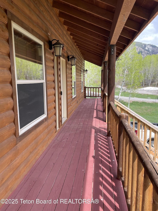 51 Cheyenne Cir, Star Valley Ranch, WY 83127 - wooden deck featuring a porch and a mountain view