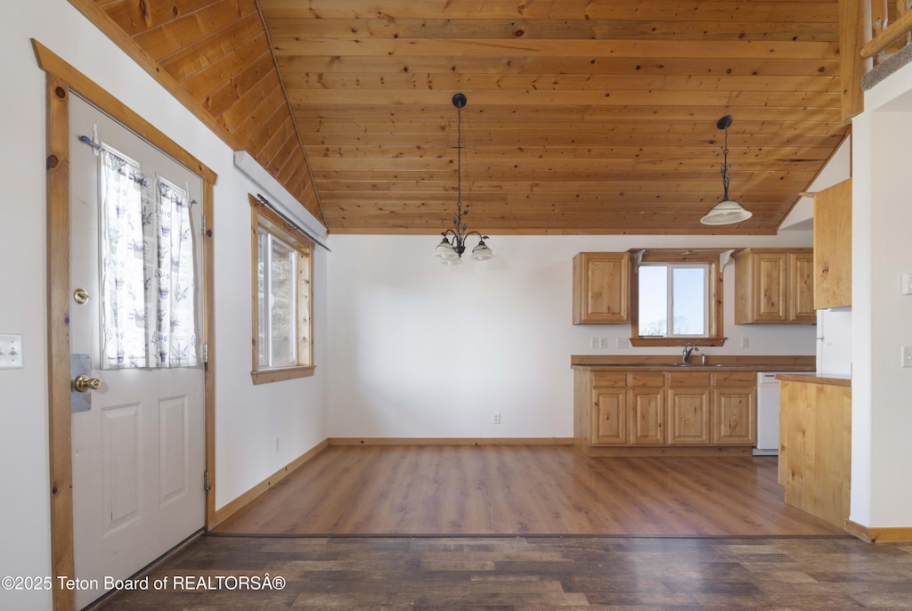 263 Friesian Cir Unit 3, Thayne, WY 83127 - kitchen featuring lofted ceiling, wooden ceiling, wood finished floors, baseboards, and white dishwasher