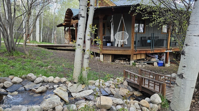 2435 Steelhead Dr, Tetonia, ID 83452 - view of home's exterior with a deck and metal roof