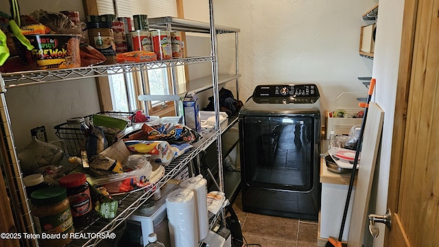 2435 Steelhead Dr, Tetonia, ID 83452 - laundry area with tile patterned floors and independent washer and dryer
