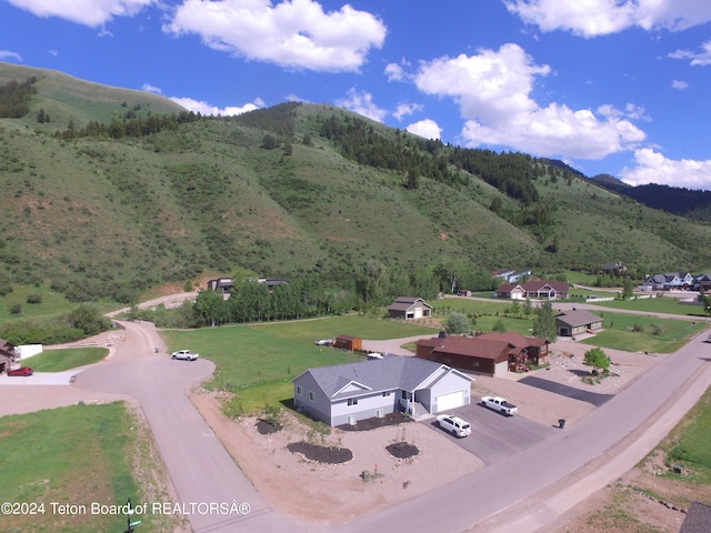 543 Rockbridge Dr, Afton, WY 83110 - aerial perspective of suburban area with a mountainous background