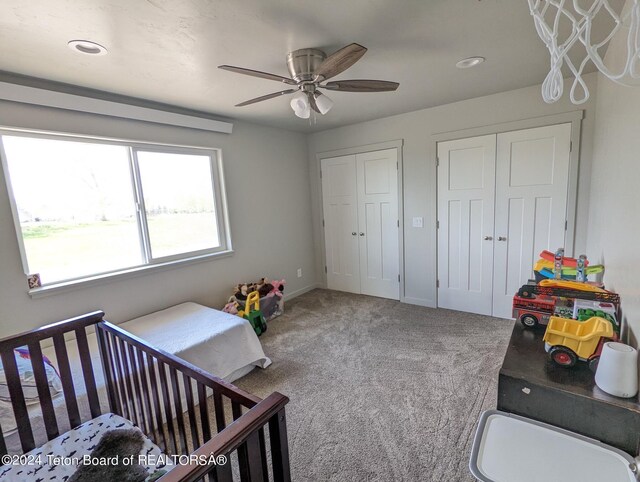 543 Rockbridge Dr, Afton, WY 83110 - carpeted bedroom featuring multiple closets, recessed lighting, and a ceiling fan
