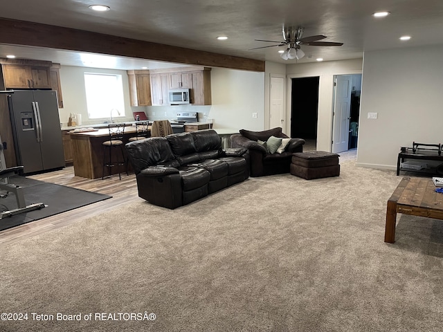543 Rockbridge Dr, Afton, WY 83110 - living room featuring recessed lighting, ceiling fan, light colored carpet, and baseboards