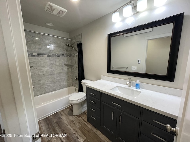 543 Rockbridge Dr, Afton, WY 83110 - bathroom with wood finished floors, toilet, vanity, and shower / bath combination