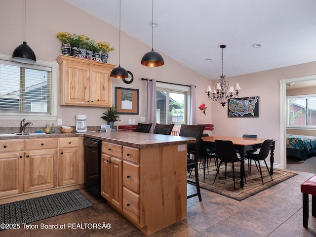 525 Booshway St, Driggs, ID 83422 - kitchen featuring dishwasher, a sink, a peninsula, light brown cabinets, and plenty of natural light