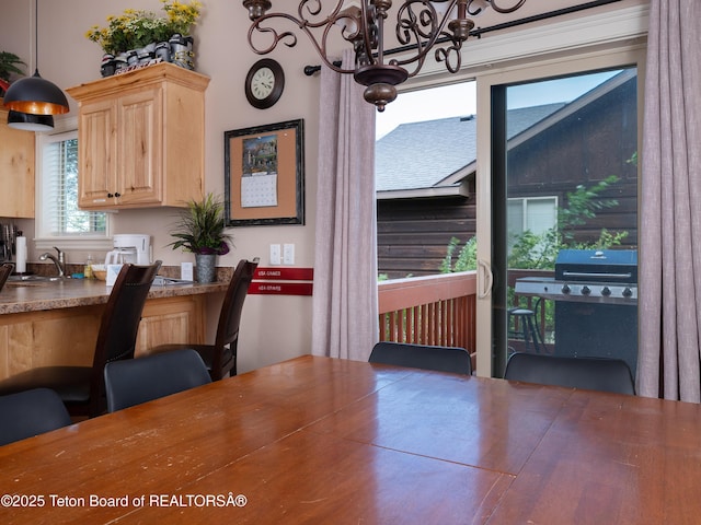525 Booshway St, Driggs, ID 83422 - dining space with a chandelier
