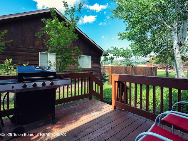 525 Booshway St, Driggs, ID 83422 - wooden deck with area for grilling