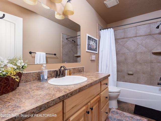 525 Booshway St, Driggs, ID 83422 - bathroom featuring vanity, toilet, and shower / bath combo
