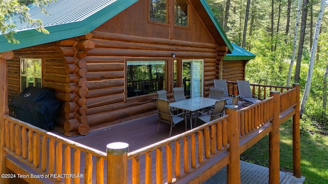 1238 Vista Dr, Star Valley Ranch, WY 83127 - wooden deck featuring outdoor dining area and grilling area