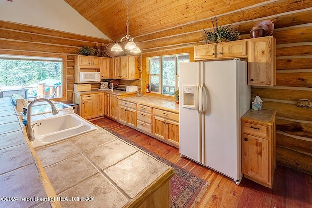 1238 Vista Dr, Star Valley Ranch, WY 83127 - kitchen featuring white appliances, a sink, tile countertops, log walls, and wooden ceiling