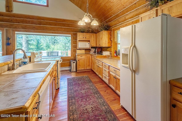 1238 Vista Dr, Star Valley Ranch, WY 83127 - kitchen featuring white appliances, a sink, wooden ceiling, lofted ceiling, and dark wood-style flooring