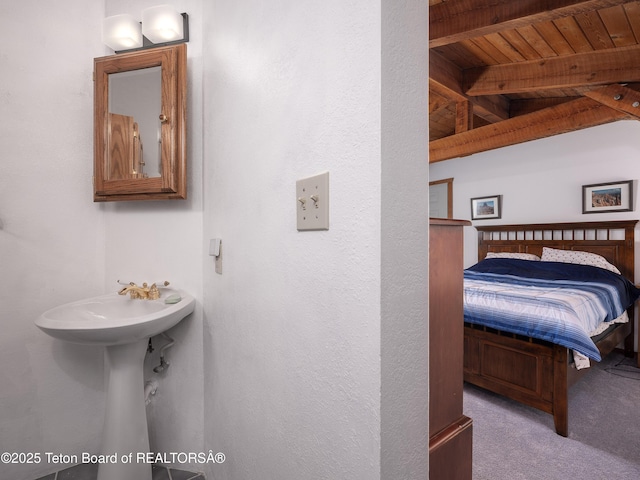 529 Quaking Aspen Dr, Driggs, ID 83422 - bathroom featuring wooden ceiling and beamed ceiling