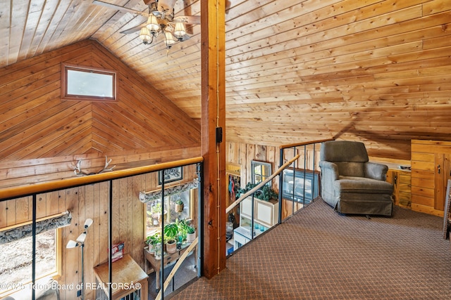 2 Porcupine Cir, Dubois, WY 82513 - unfurnished room with wood walls, a ceiling fan, vaulted ceiling, wood ceiling, and healthy amount of natural light