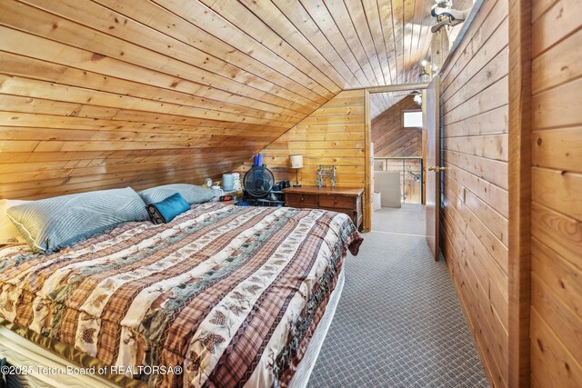2 Porcupine Cir, Dubois, WY 82513 - bedroom featuring wood walls, wooden ceiling, carpet floors, and lofted ceiling