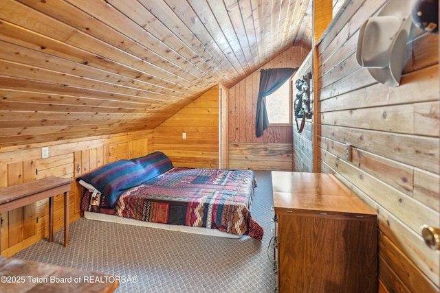 2 Porcupine Cir, Dubois, WY 82513 - carpeted bedroom with wooden walls, vaulted ceiling, and wooden ceiling